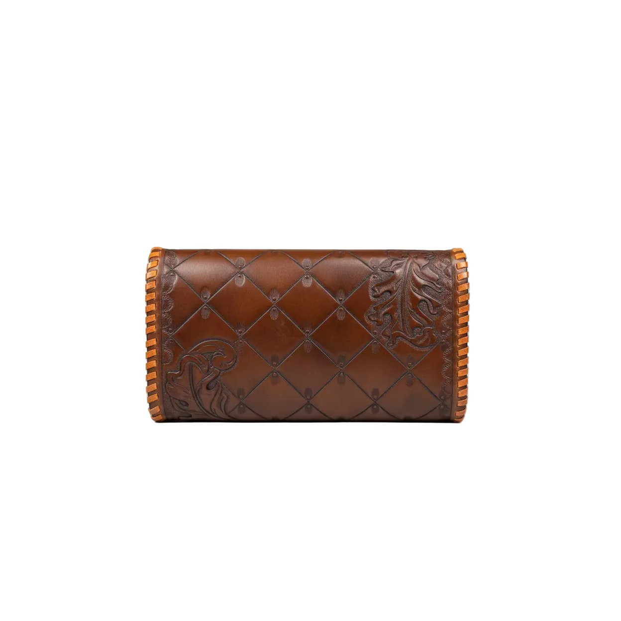 A brown leather cylindrical pouch or sleeve with tooled floral and diamond quilted patterns, finished with orange-brown braided trim on the sides, shown on a rustic wooden surface.