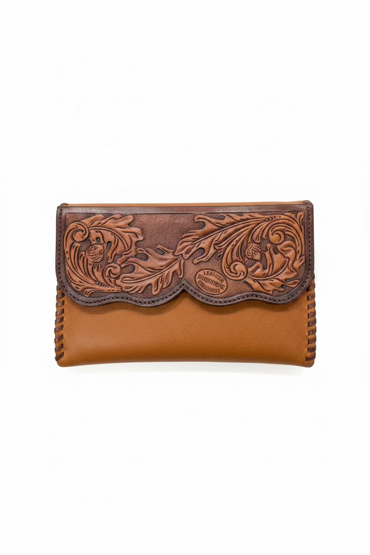 A brown leather wallet with an embossed floral scroll pattern on the flap, shown against a plain white background.